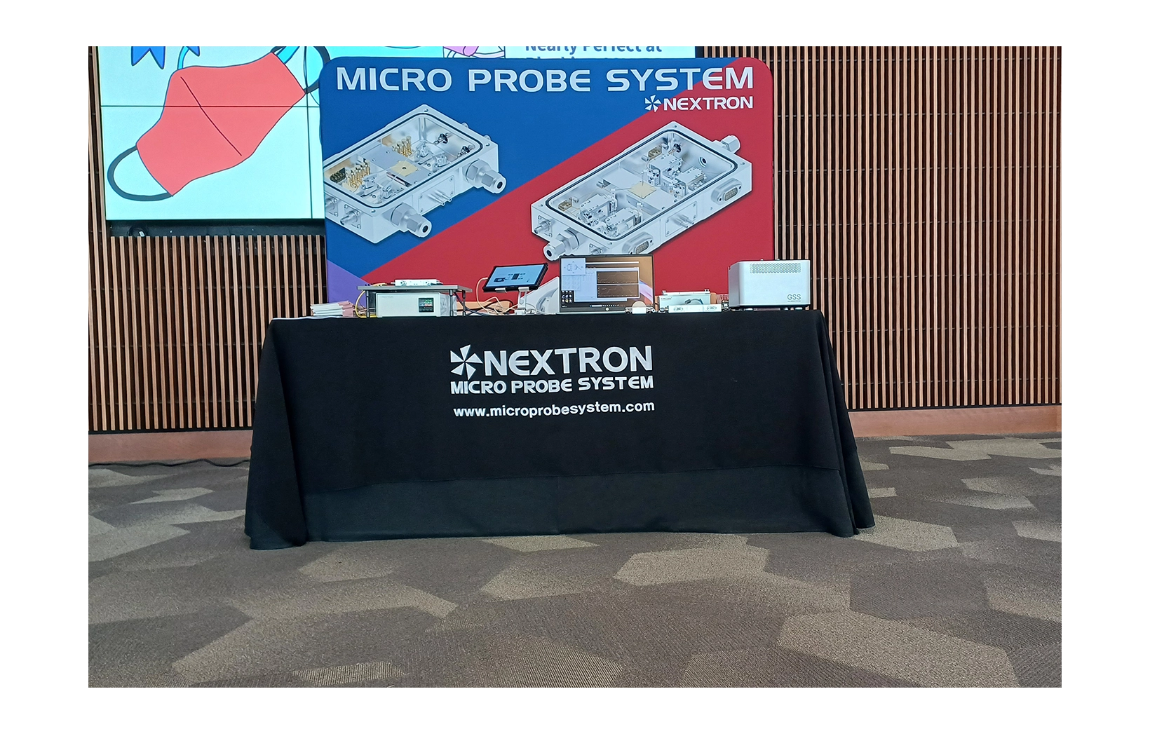 Nextron promotional booth at 2024 EMC&DRC